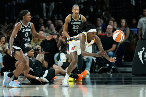 Indiana Fever forward Natasha Howard (6) passes the ball against the Las Vegas Aces during the first half of Game 5 of a WNBA basketball playoff semifinals series Tuesday, Sept. 30, 2025, in Las Vegas. (AP Photo/John Locher) Indiana Fever forward Natasha Howard (6) passes the ball against the Las Vegas Aces during the first half of Game 5 of a WNBA basketball playoff semifinals series Tuesday, Sept. 30, 2025, in Las Vegas. (AP Photo/John Locher)