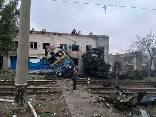 In this photo provided by Office of the Deputy Prime Minister for Restoration and Development on Thursday, Oct. 2, 2025, a railway worker stands in front of a train locomotive destroyed by a Russian strike in Odesa, Ukraine. (Office of the Deputy Prime Minister for Restoration and Development via AP) In this photo provided by Office of the Deputy Prime Minister for Restoration and Development on Thursday, Oct. 2, 2025, a railway worker stands in front of a train locomotive destroyed by a Russian strike in Odesa, Ukraine. (Office of the Deputy Prime Minister for Restoration and Development via AP)