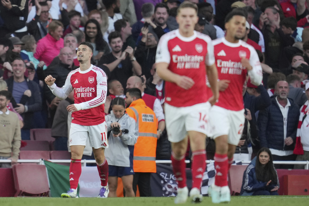 Arsenal's Gabriel Martinelli reacts after scoring during the Premier League soccer match between Arsenal and Manchester City in London, Sunday, Sept. 21, 2025. (AP Photo/Kin Cheung)