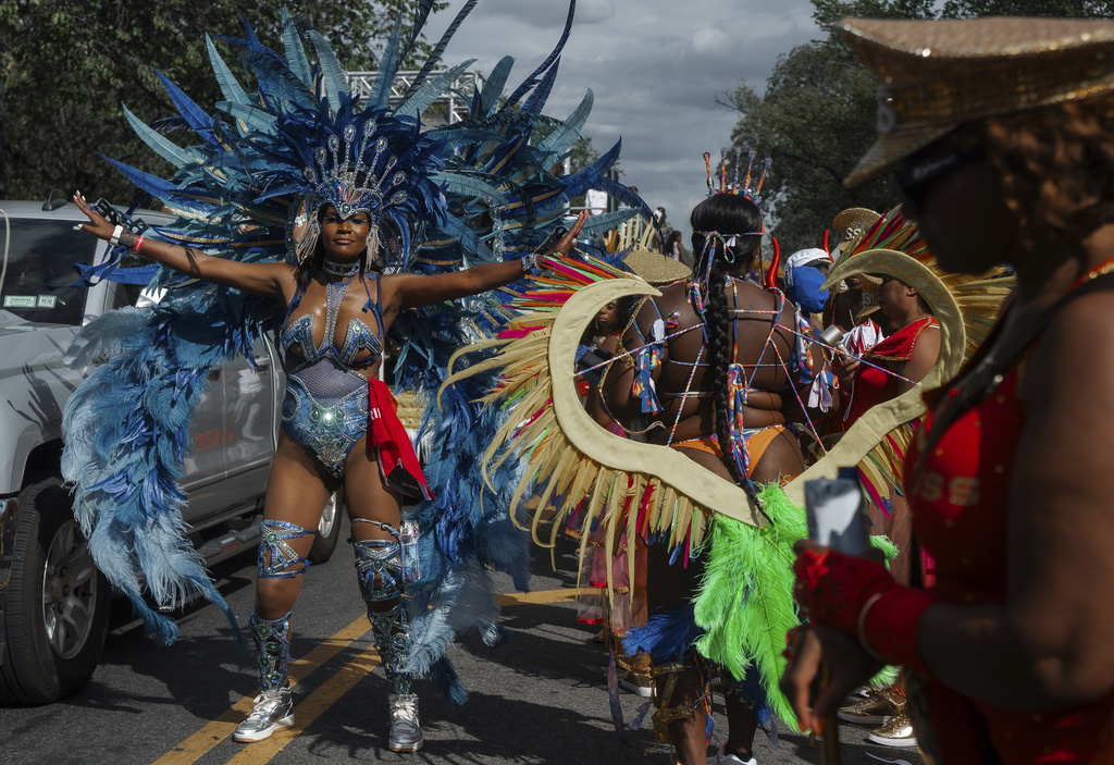 Costumed dancers perform during the West Indian Day Parade on Monday, Sept. 1, 2025, in the Brooklyn borough of New York. (AP Photo/Olga Fedorova)
