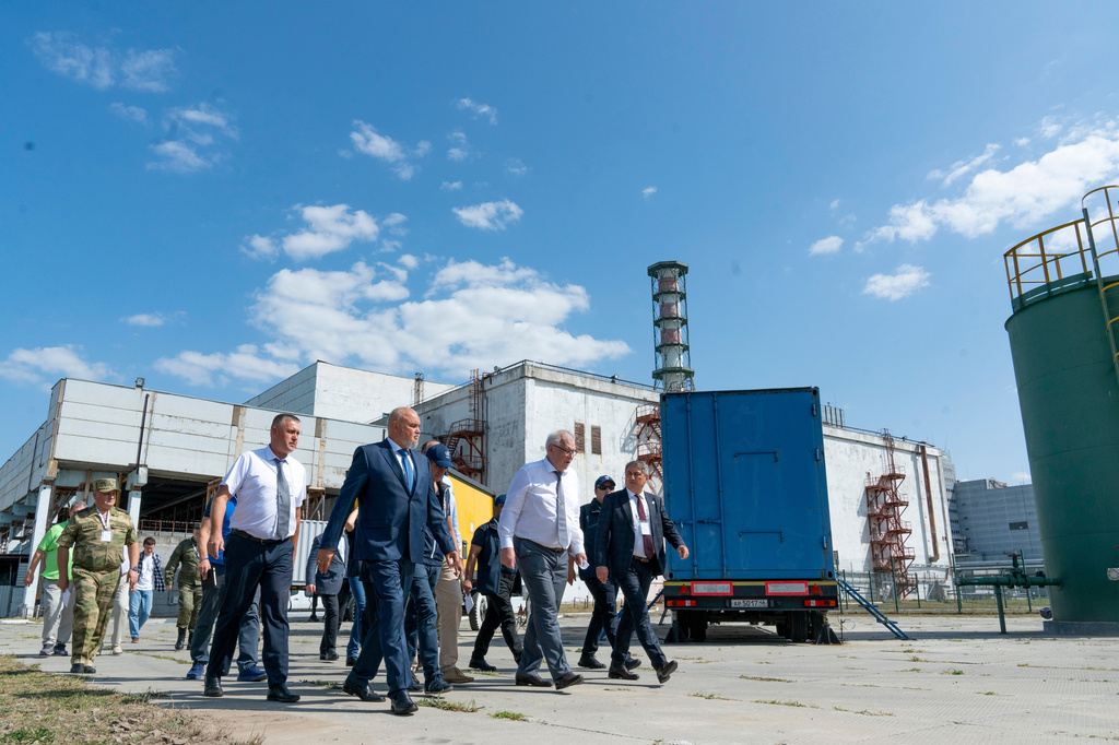 FILE - In this photo released by Rosatom State Atomic Energy Corporation, International Atomic Energy Agency Director General Rafael Grossi, center, walks with members of his delegation and employees while visiting the Kursk Nuclear Power Plant outside the town of Kurchatov, Russia, on Aug. 27, 2024. (Rosatom State Atomic Energy Corporation via AP, File)