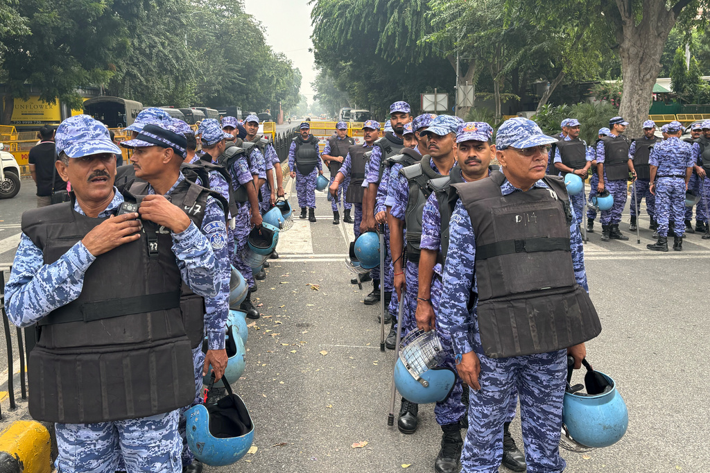 Security personnel assemble near the venue of a youth protest demanding the resignation of the country's election chief Gyanesh Kumar, in New Delhi, India, Saturday, Oct. 10, 2026. (AP Photo/Manish Swarup)