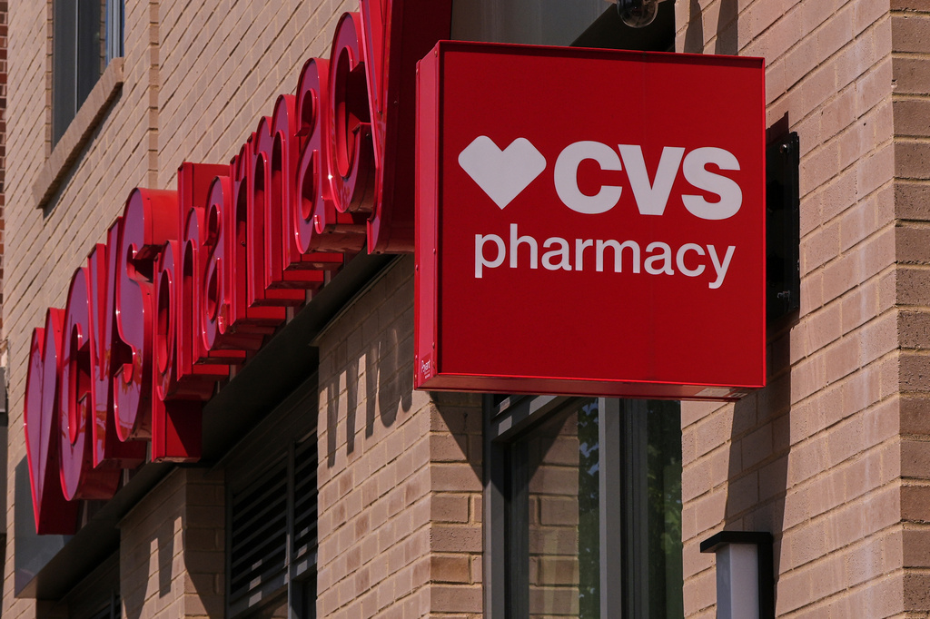 FILE - The CVS logo is displayed on a pharmacy and retail location, Wednesday, Aug. 13, 2025, in Newton, Mass. (AP Photo/Charles Krupa, File)