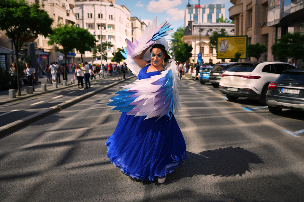 Antonella Lerca Duda, who identifies as a Roma transgender woman, strikes a pose before the start of the Bucharest Pride Parade, in Bucharest, Romania, Saturday, June 13, 2026. (AP Photo/Andreea Alexandru)