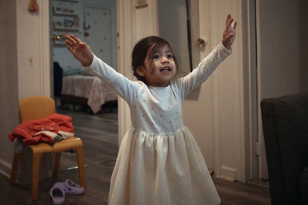 A child plays in an apartment building where tenants report maintenance issues and pest infestations, in the Bronx borough of New York, Tuesday, March 17, 2026. (AP Photo/Andres Kudacki)