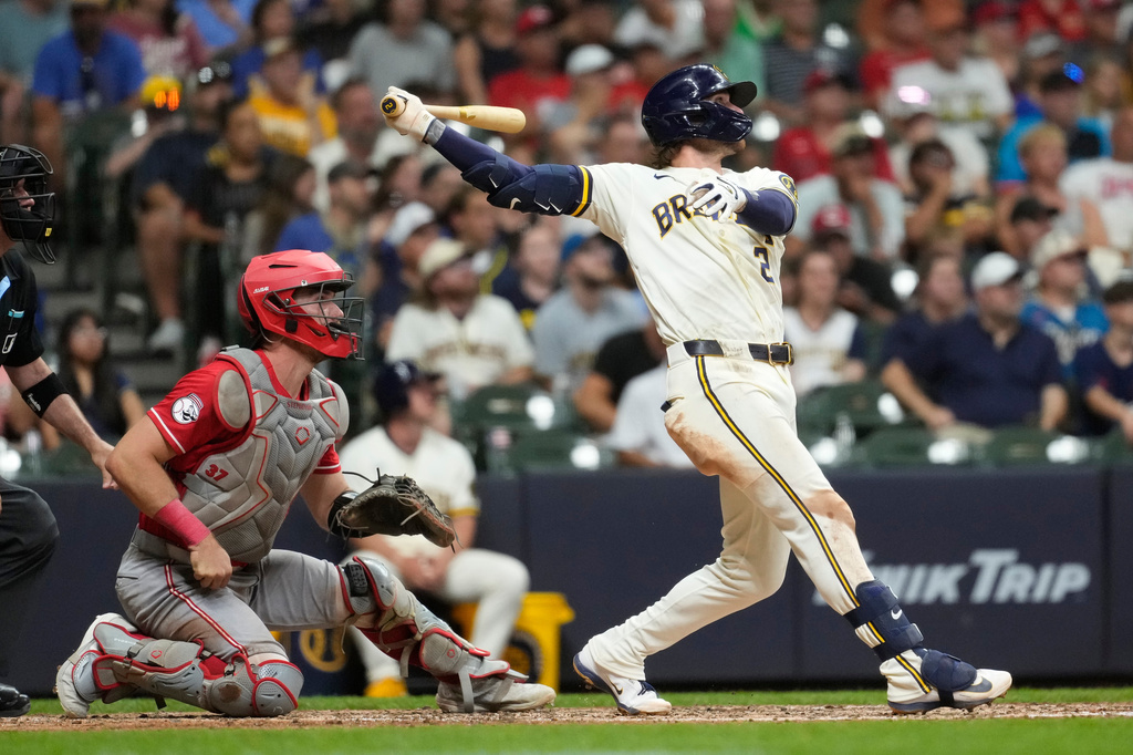 Milwaukee Brewers' Brice Turang hits a solo home run during the seventh inning of a baseball game against the Cincinnati Reds, Monday, June 29, 2026, in Milwaukee. (AP Photo/Aaron Gash)