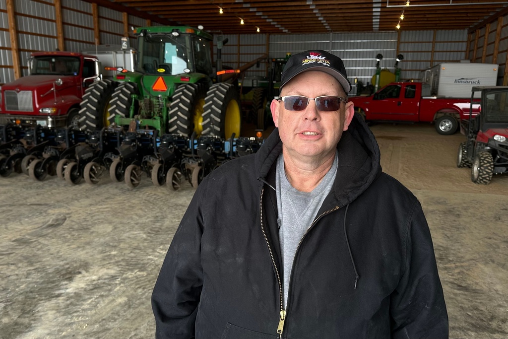 Charlie Radman, a corn and soybean farmer, stands for a photo on the land his family has owned since 1899, near Randolph, Minn., Wednesday, Dec. 10, 2025. (AP Photo/Mark Vancleave)