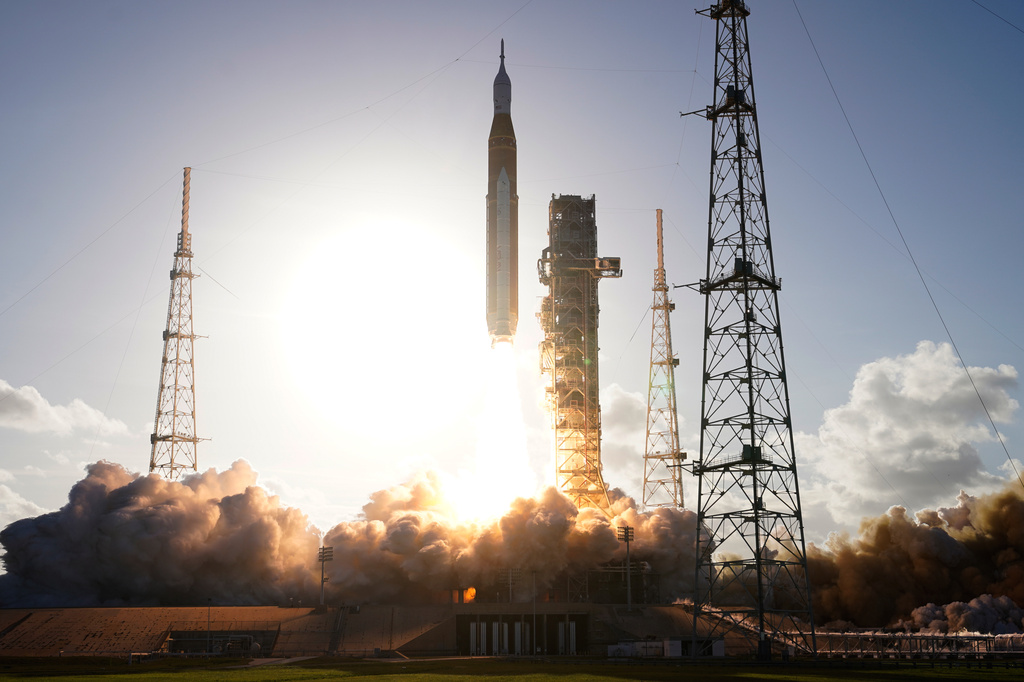 The NASA Artemis II SLS (Space Launch System) rocket with the Orion spacecraft launches at the Kennedy Space Center, Wednesday, April 1, 2026, in Cape Canaveral, Fla. (AP Photo/Chris O'Meara) CORRECTION: photographer is Chris O'Meara, not John Raoux