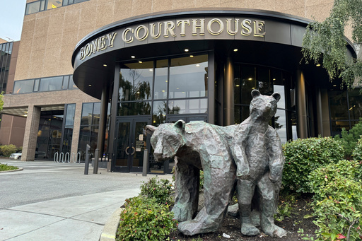 FILE - Bear sculptures sit outside the Boney Courthouse, where the Alaska Supreme Court hears cases, in downtown Anchorage, Alaska, Sept. 10, 2024. (AP Photo/Mark Thiessen, File) FILE - Bear sculptures sit outside the Boney Courthouse, where the Alaska Supreme Court hears cases, in downtown Anchorage, Alaska, Sept. 10, 2024. (AP Photo/Mark Thiessen, File)