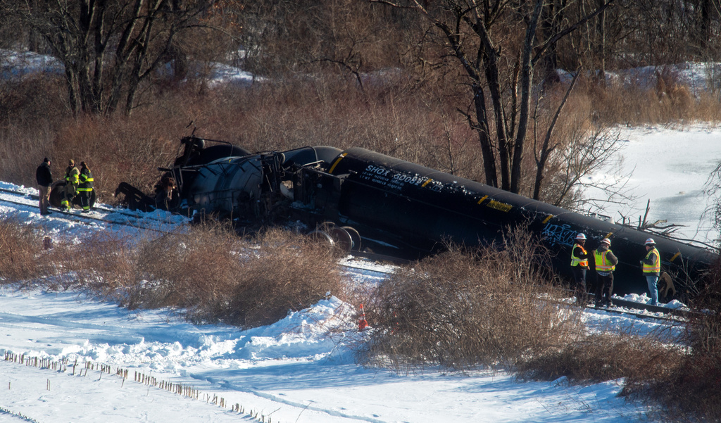 Crews inspect the scene after a freight train derailment, in Mansfield, Conn., Thursday, Feb. 5, 2026. (Aaron Flaum/Hartford Courant via AP)