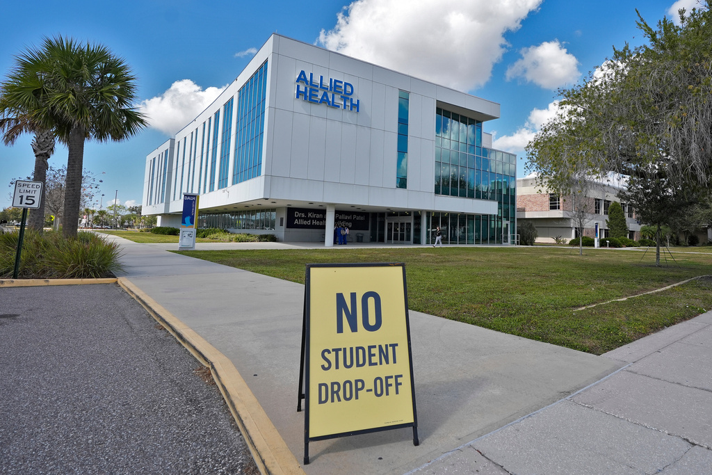 A sign is propped up in front of the Allied Health building at Hillsborough Community College, Friday, Jan. 23, 2026, in Tampa, Fla. (AP Photo/Chris O'Meara)