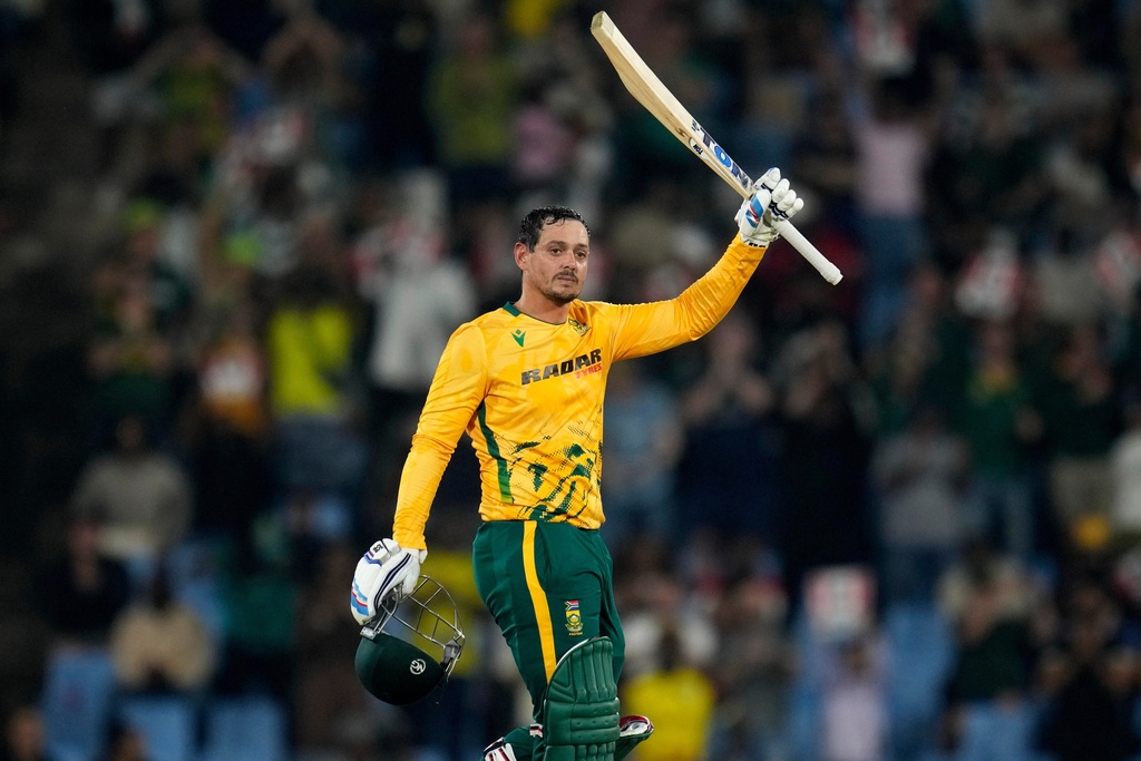 South Africa's batsman Quinton de Kock raises his bat after reaching a century during the T20 International cricket match between South Africa and West Indies, in Centurion, South Africa, Thursday, Jan. 29, 2026. (AP Photo/Themba Hadebe)
