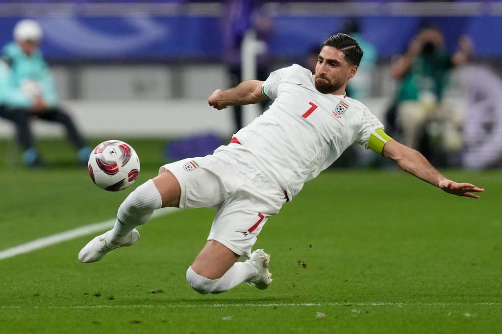 FILE - Iran's Alireza Jahanbakhsh passes the ball during the Asian Cup Group C soccer match between Hong Kong and Iran at Khalifa International Stadium in Doha, Qatar, Friday, Jan. 19, 2024. (AP Photo/Thanassis Stavrakis, File)