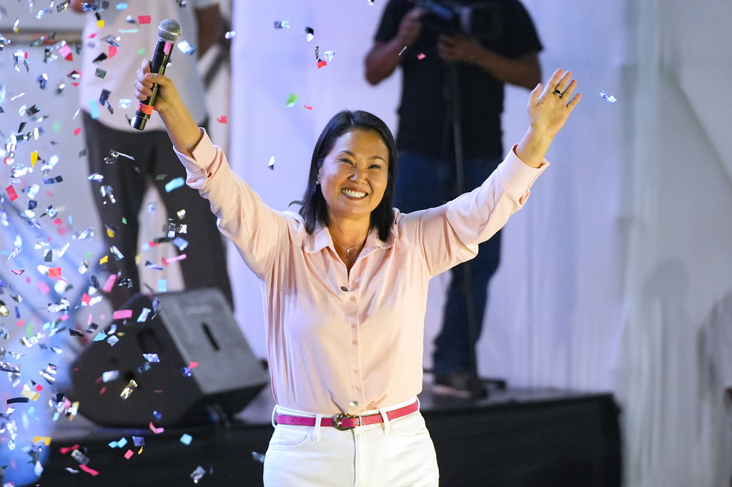 Presidential candidate Keiko Fujimori, of the Popular Force party, waves to supporters in San Juan de Lurigancho district in Lima, Peru, Saturday, May 9, 2026. (AP Photo/Guadalupe Pardo)