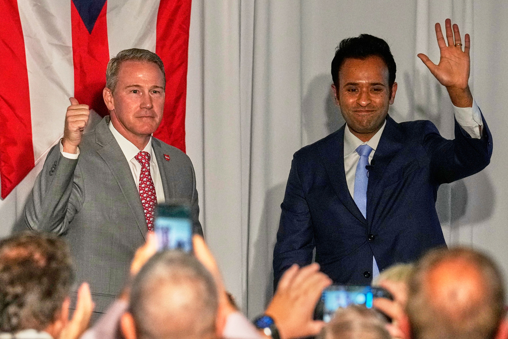 Republicans U.S. Sen. Jon Husted, left, candidate for Senate in 2026, and Vivek Ramaswamy, right, candidate for Ohio Governor in 2026, are pictured at an event where they endorsed each other in Columbus, Ohio, Monday, Sept. 22, 2025. (AP Photo/Sue Ogrocki)