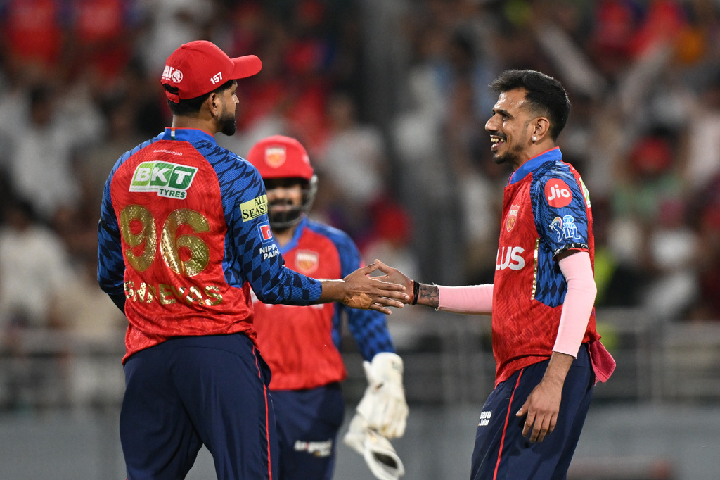 Punjab Kings' Yuzvendra Chahal, right, and Punjab Kings' captain Shreyas Iyer celebrates the wicket of Rajasthan Royals' Dhruv Jurel during the Indian Premier League cricket match between Rajasthan Royals and Punjab Kings in New Chandigarh, India, Tuesday, April 28, 2026.(AP Photo)