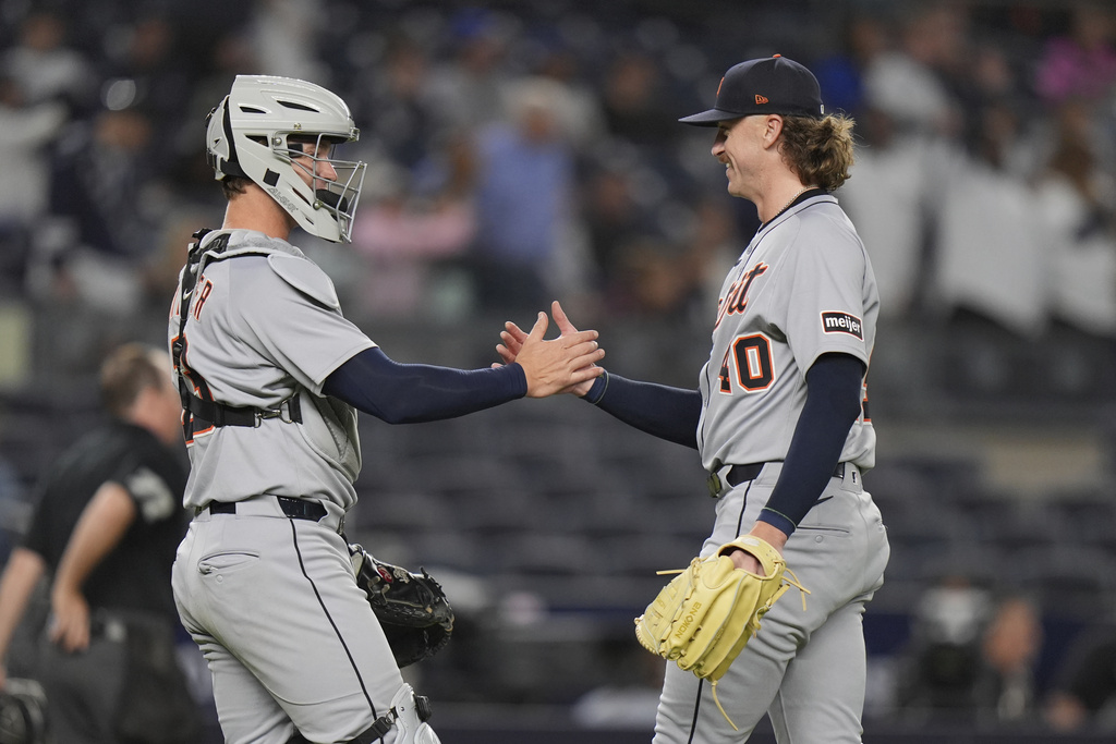Detroit Tigers pitcher Chris Paddack, right, celebrates with catcher Dillon Dingler after a baseball game against the New York Yankees Tuesday, Sept. 9, 2025, in New York. (AP Photo/Frank Franklin II)