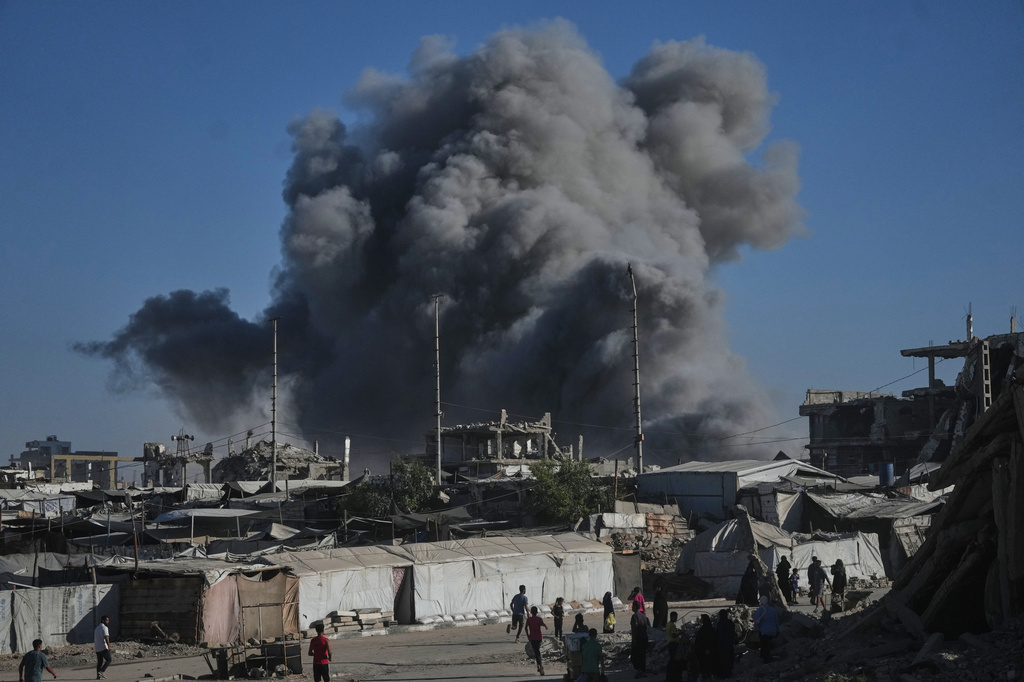 Smoke rises following an Israeli military strike in Gaza City, Monday, Aug. 24, 2026. (AP Photo/Jehad Alshrafi)