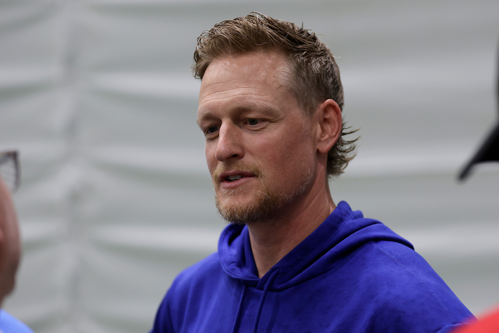 FILE - New York Giants outside linebackers coach Charlie Bullen speaks with the media before an NFL football practice, May 23, 2024, in East Rutherford, N.J. (AP Photo/Adam Hunger, file)