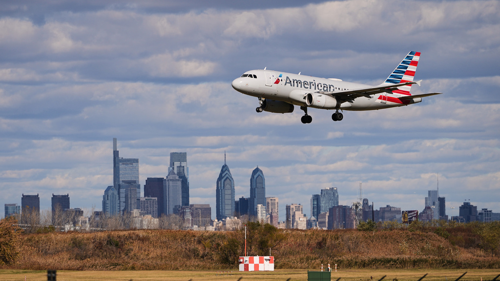 FILE - An aircraft lands at Philadelphia International Airport in Philadelphia, Nov. 6, 2025. (AP Photo/Matt Rourke, File)