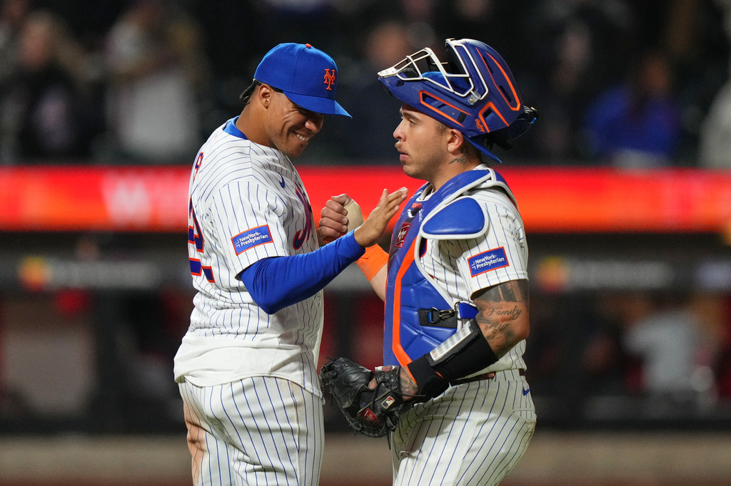 New York Mets' Juan Sot, left, celebrates with Francisco Alvarez after a baseball game against the Minnesota Twins Wednesday, April 22, 2026, in New York. (AP Photo/Frank Franklin II)