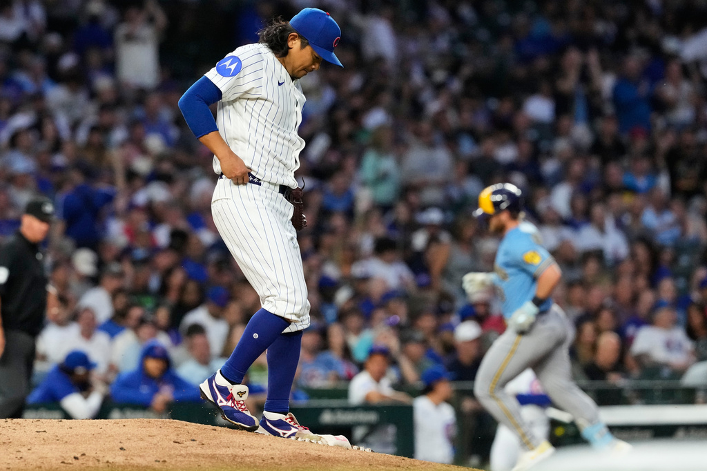 Chicago Cubs starting pitcher Shota Imanaga, of Japan, looks down after Milwaukee Brewers' Jake Bauers hit a three-run home run during the fifth inning of a baseball game in Chicago, Monday, May 18, 2026. (AP Photo/Nam Y. Huh)