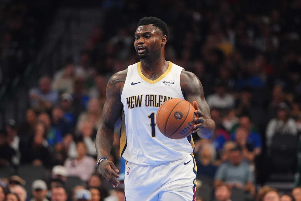 New Orleans Pelicans forward Zion Williamson dribbles the ball during the first half of an NBA Cup basketball game against the Dallas Mavericks in Dallas, Friday, Nov. 21, 2025. (AP Photo/LM Otero)