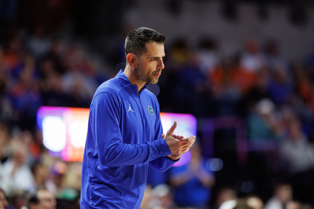 Florida head coach Todd Golden paces the sidelines during the first half of an NCAA college basketball game against Dartmouth, Monday, Dec. 29, 2025, in Gainesville, Fla. (AP Photo/Chris Watkins)