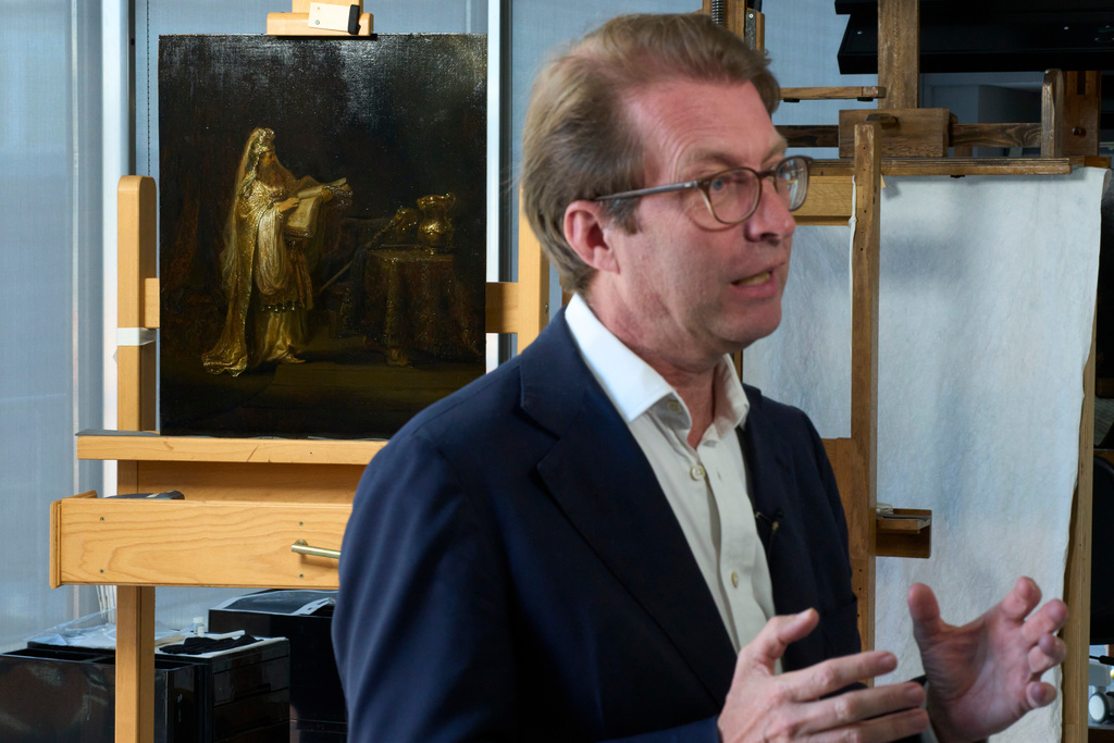 Director Taco Dibbits of the Rijksmuseum unveiled the work "Vision of Zacharias in the Temple" during a press preview in Amsterdam, Netherlands, Monday, March 2, 2026 and said two years of analysis has confirmed it was painted by Rembrandt. (AP Photo/Peter Dejong)