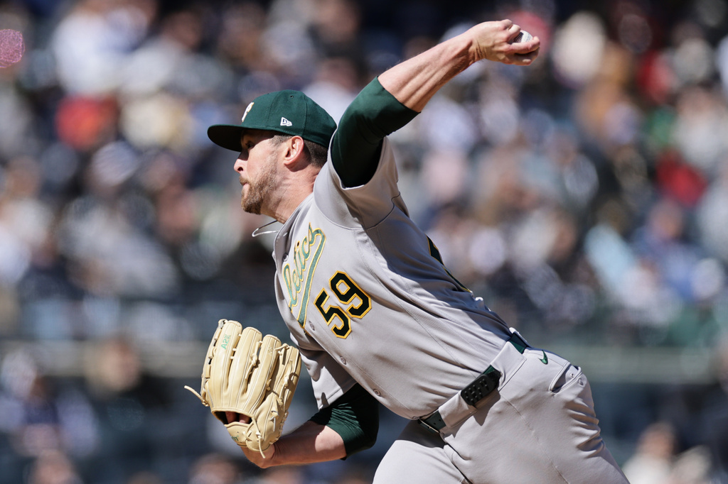 Athletics pitcher Jeffrey Springs throws during the fifth inning of a baseball game against the New York Yankees, Thursday, April 9, 2026, in New York. (AP Photo/Adam Hunger)