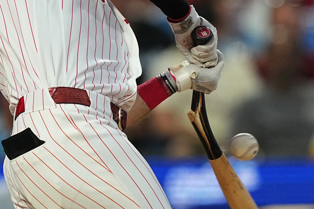 Philadelphia Phillies' Brandon Marsh brakes his bat while grounding out off a pitch by Miami Marlins pitcher Josh Ekness a during the fourth inning of a baseball game, Tuesday, Aug. 18, 2026, in Philadelphia. (AP Photo/Matt Rourke)