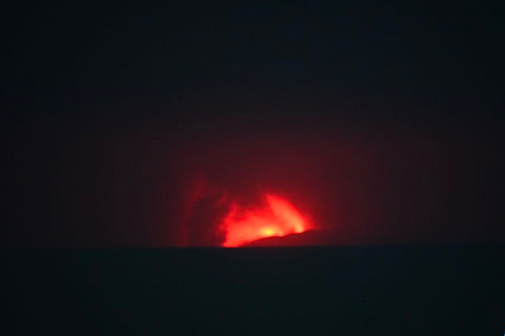 In this image released by Indonesia's Center for Volcanology and Geological Disaster Mitigation Agency (PVMBG), lava glows during the eruption of Mount Anak Krakatau in Sunda Strait, Indonesia, Saturday, Sept. 5, 2026. (PVMBG via AP)