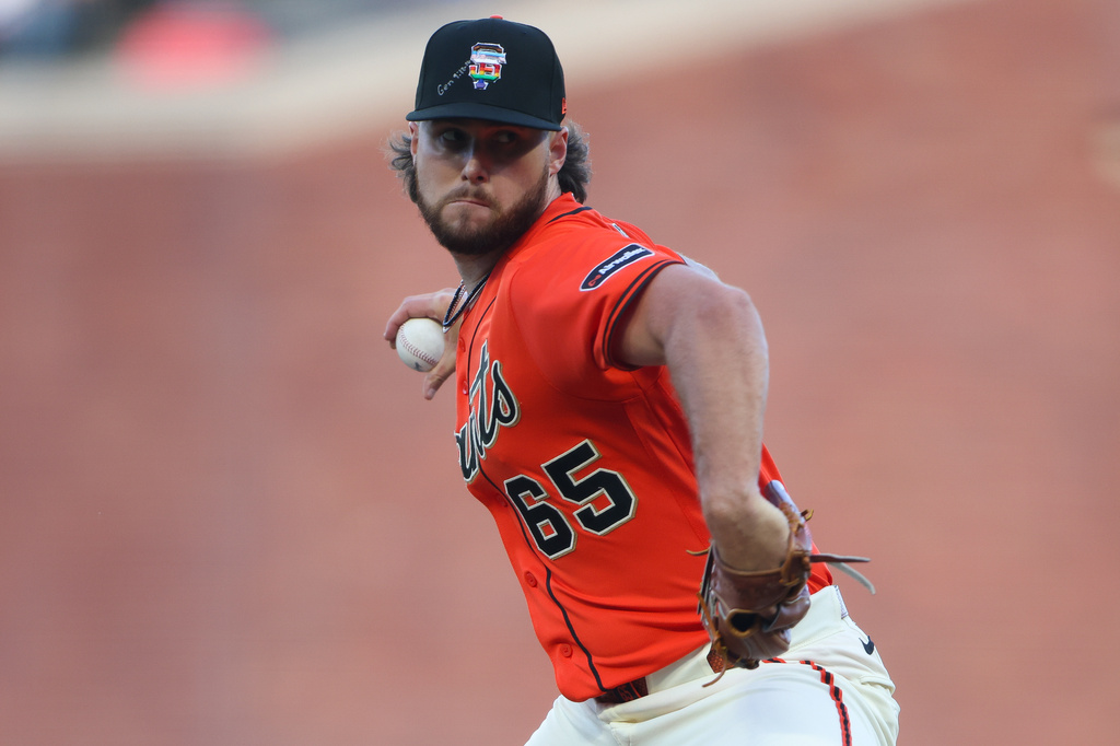 San Francisco Giants pitcher Landen Roupp throws to a Chicago Cubs batter during the first inning of a baseball game Friday, June 12, 2026, in San Francisco, Calif. (AP Photo/Scott Marshall)