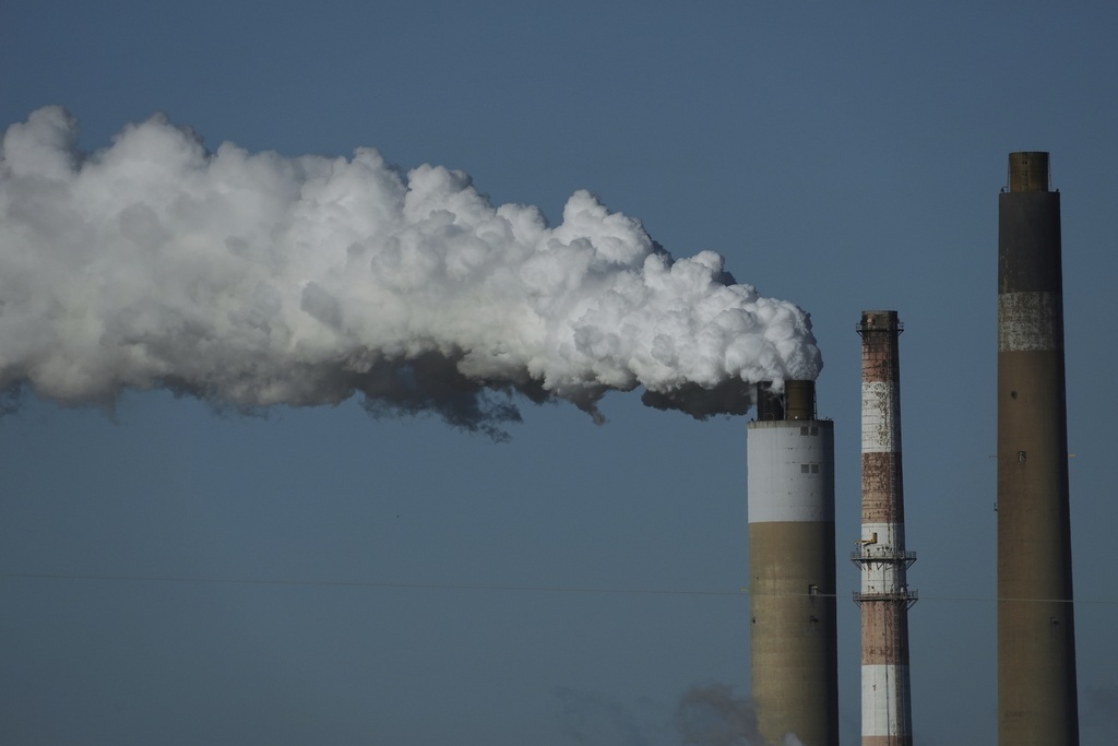 FILE - The Warrick Power Plant, a coal-powered generating station, operates April 8, 2025, in Newburgh, Ind. (AP Photo/Joshua A. Bickel, File)