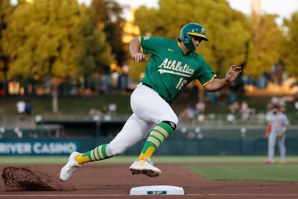 FILE - Athletics' Nick Kurtz rounds third base before scoring during the first inning of a baseball game against the Detroit Tigers Aug. 27, 2025, in West Sacramento, Calif. (AP Photo/Sergio Estrada, File)