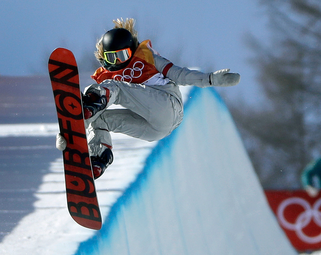 FILE - Chloe Kim, of the United States, jumps during the women's halfpipe finals at Phoenix Snow Park at the 2018 Winter Olympics in Pyeongchang, South Korea, on Feb. 13, 2018. (AP Photo/Gregory Bull, File)