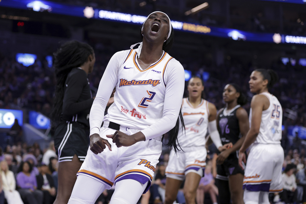 Phoenix Mercury's Kahleah Cooper (2) celebrates a basket and a foul during the first half against the Golden State Valkyries in a WNBA basketball game in San Francisco on Tuesday, Aug. 19, 2025. (Scott Strazzante/San Francisco Chronicle via AP)