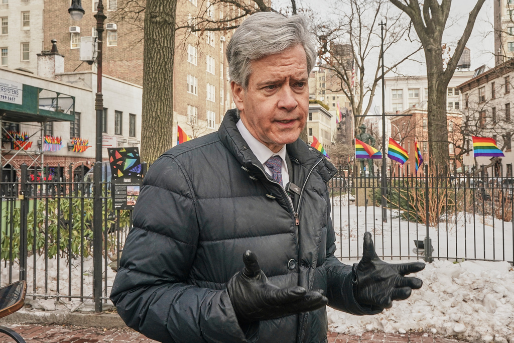 Manhattan borough president Brad Hoylman-Sigal speaks in the Stonewall National Monument about how the Trump administration has stopped flying a rainbow flag at the location, right center, adjacent to the Stonewall Inn, left, New York, Tuesday, Feb. 10, 2026. (AP Photo/Richard Drew)