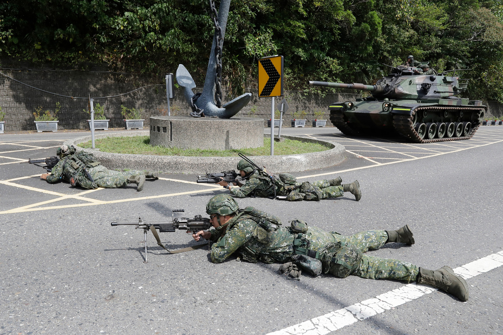 Soldiers participate in the annual Han Kuang military exercises in Yilan, northeastern Taiwan, Monday, Aug. 10, 2026. (AP Photo/Chiang Ying-ying, Pool)