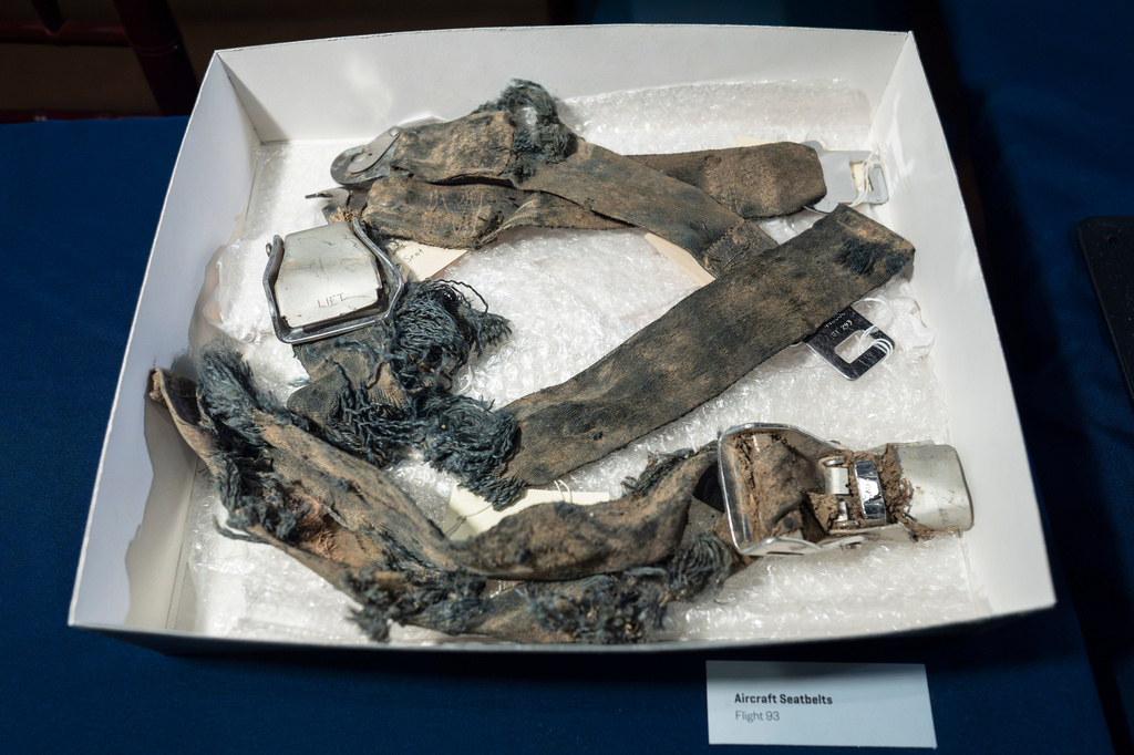 Seatbelts recovered from the wreckage of United Airlines Flight 93 in Shanksville, Pa., are displayed at the Smithsonian's National Museum of American History in Washington, Thursday, Sept. 10, 2026. (AP Photo/J. Scott Applewhite)