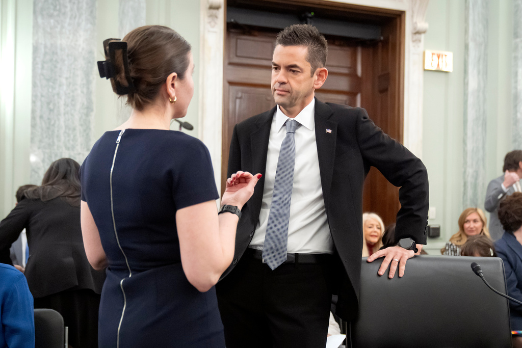 Jared Isaacman, President Donald Trump's pick to be NASA Administrator, stands before a hearing of the Senate Commerce, Science, and Transportation Committee on Capitol Hill, Wednesday, Dec. 3, 2025, in Washington. (AP Photo/Mark Schiefelbein)