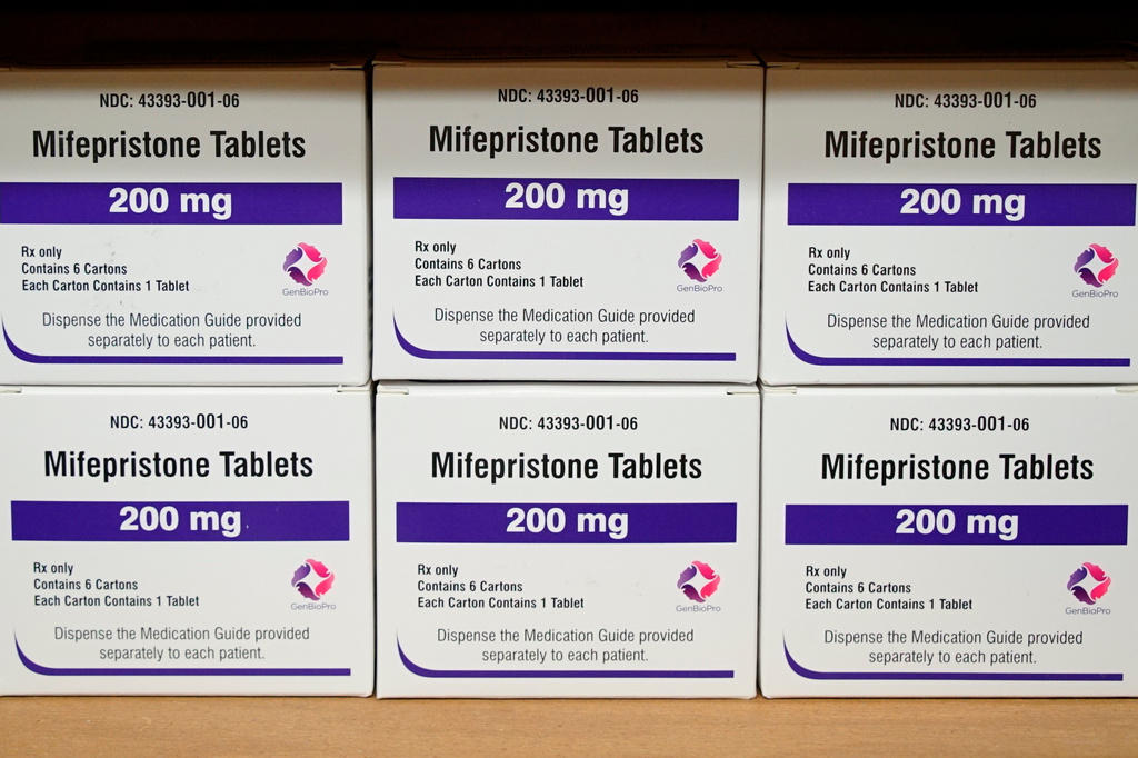 FILE - Boxes of the drug mifepristone sit on a shelf at the West Alabama Women's Center in Tuscaloosa, Ala., March 16, 2022. (AP Photo/Allen G. Breed, File)
