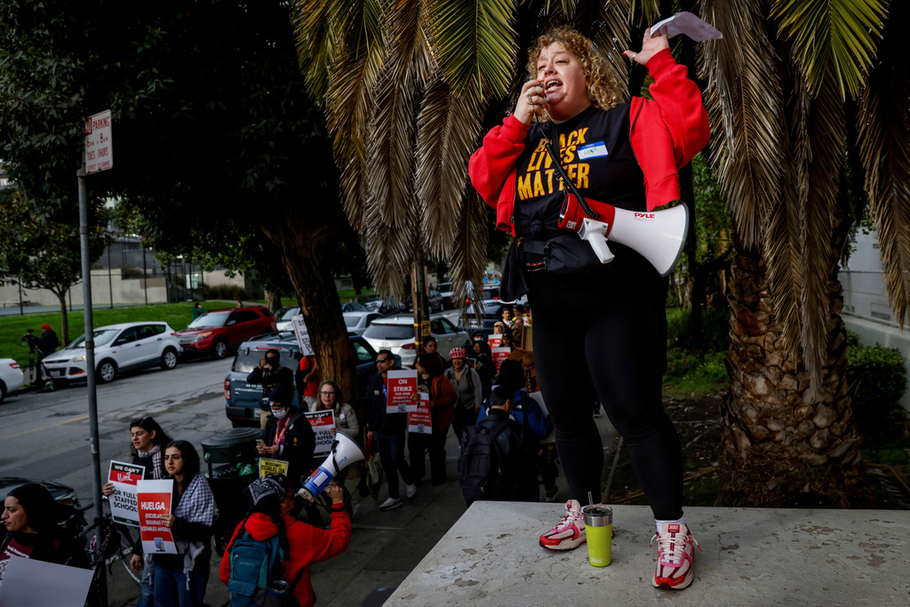 English and Physical Education teacher Alison White leads a chant as teachers and San Francisco Unified School District staff join a city-wide protest to demand a fair contract at Mission High School, Monday, Feb. 9, 2026, in San Francisco. (Brontë Wittpenn/San Francisco Chronicle via AP)