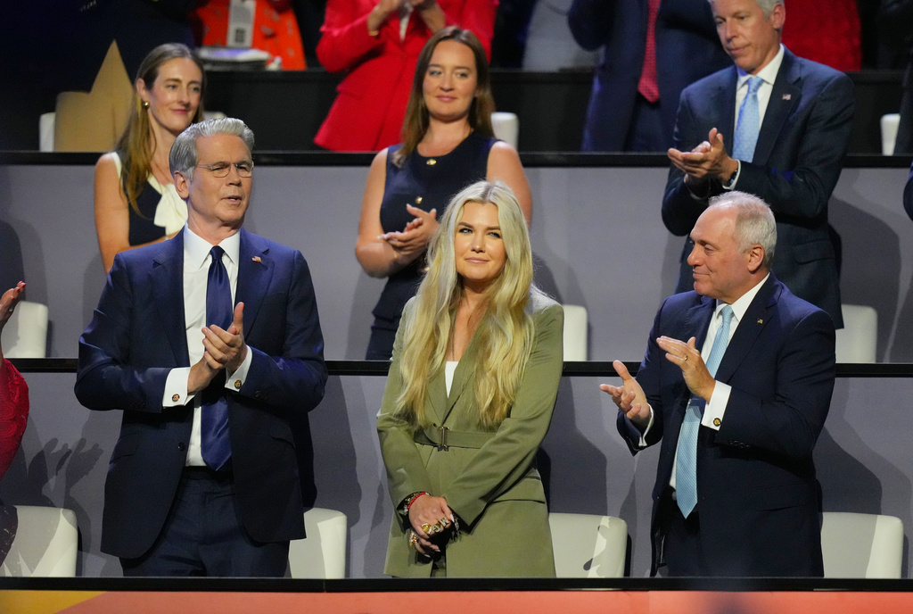 Turning Point USA CEO Erika Kirk stands for an applaud as President Donald Trump speaks at the Republican convention Wednesday, Sept. 9, 2026, in Dallas. (AP Photo/Julio Cortez)