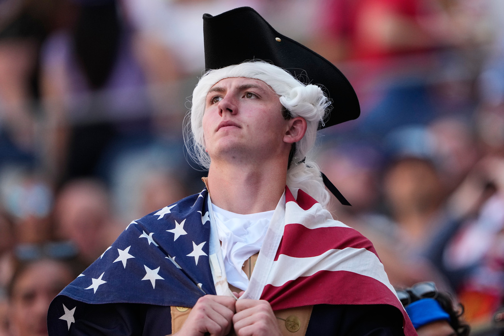 A United States fan reacts during the World Cup round of 16 soccer match between the United States and Belgium in Seattle, Monday, July 6, 2026. (AP Photo/Lindsey Wasson)