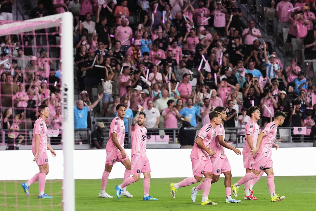 Inter Miami forward Lionel Messi, third left, celebrates with teammates after scoring a goal against Austin FC during the first half of an MLS soccer match, Saturday, April 4, 2026, in Miami. (AP Photo/Rebecca Blackwell)