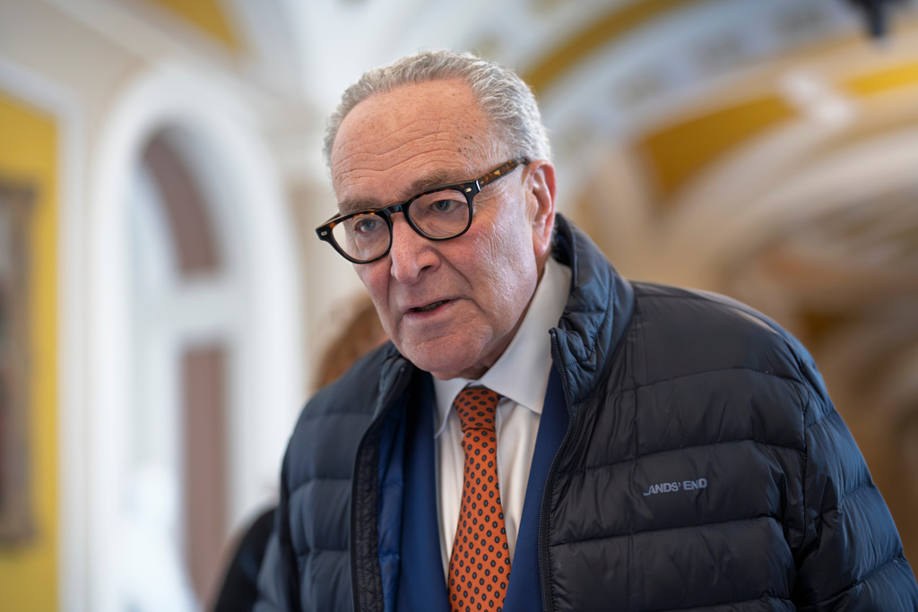 Senate Minority Leader Chuck Schumer, D-N.Y., arrives at his office as the Senate returns at the Capitol in Washington, Tuesday, Jan. 27, 2026. (AP Photo/J. Scott Applewhite)