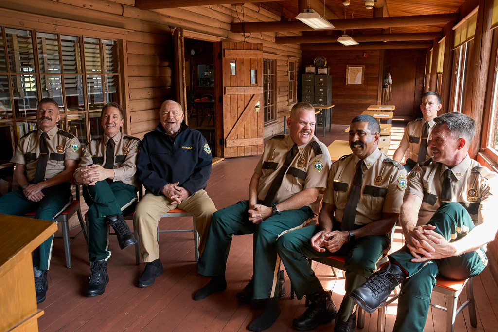 This image released by Searchlight Pictures shows, from left, Steve Lemme, Paul Soter, Brian Cox, Kevin Heffernan, Jay Chandrasekhar, Andrew Dismukes, and Erik Stolhanske from the film "Super Troopers 3." (Patrick Harbron/Searchlight Pictures via AP)