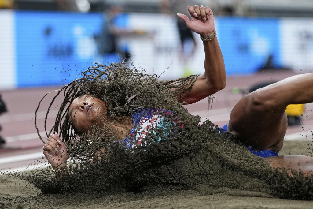 United States' Tara Davis-Woodhall competes in the women's long jump final at the World Athletics Championships in Tokyo, Sunday, Sept. 14, 2025. (AP Photo/Ashley Landis)
