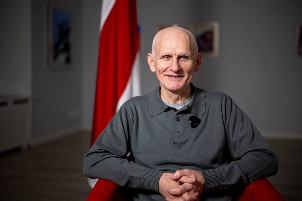 Nobel Peace Prize laureate Ales Bialiatski, one of the Belarusian prisoners released on Saturday, smiles during an interview with the Associated Press in Vilnius, Lithuania, on Sunday, Dec. 14, 2025. (AP Photo/Mindaugas Kulbis)